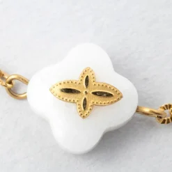 Fabrique de Styles Bijoux Fantaisie*Bracelet en acier doré et blanc - trefle